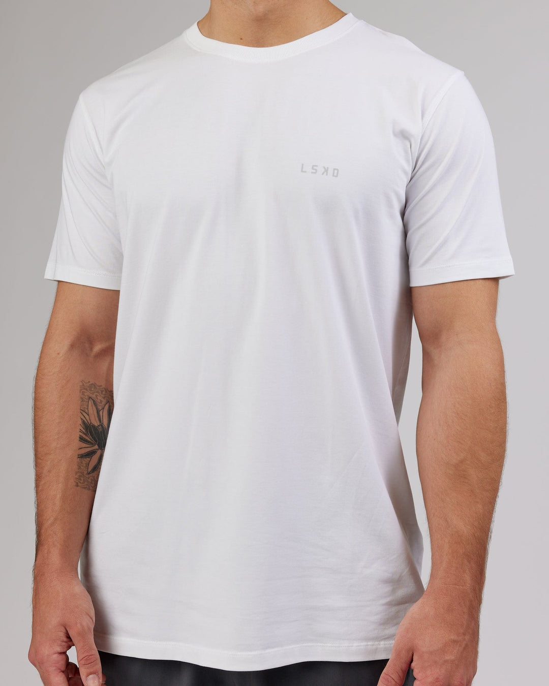 Man wearing PimaFLX Tee - White