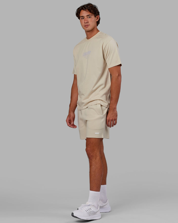 Man wearing Unisex Standard Heavyweight Tee Oversize - Bone