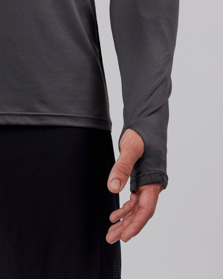 Man wearing Streamlined 1/4 Zip Active Long Sleeve - Asphalt