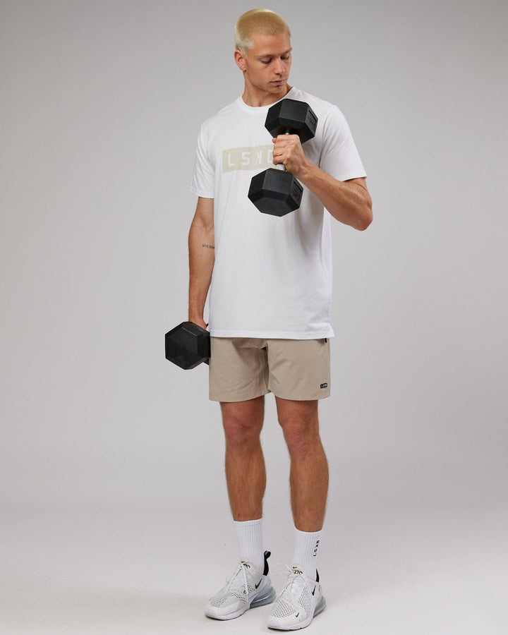 Man wearing Strength FLXDRY Performance Tee - White-Taupe