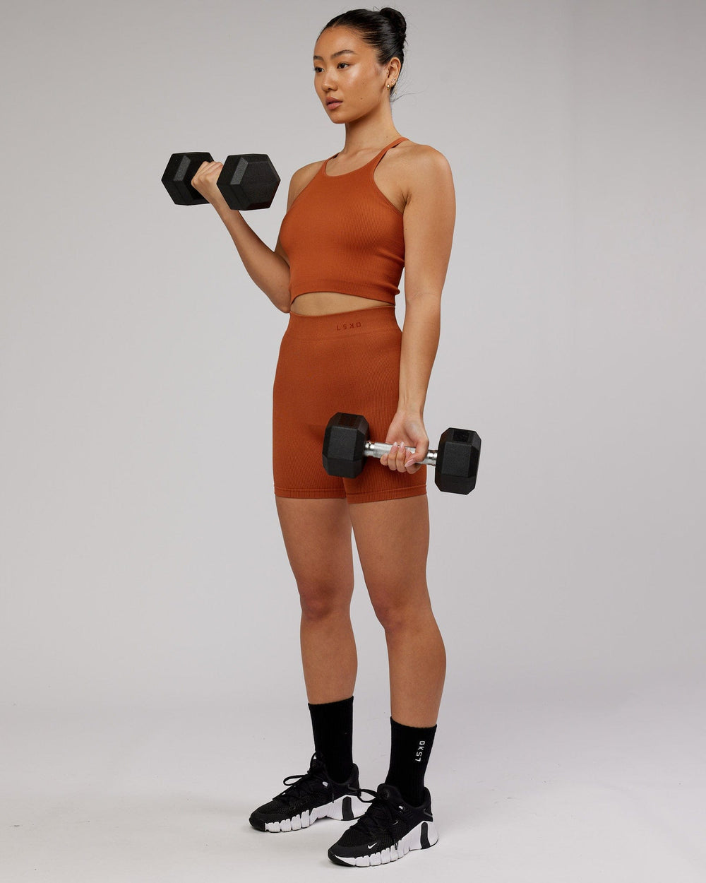 Woman wearing Minimal Seamless Crop Ribbed Tank - Auburn