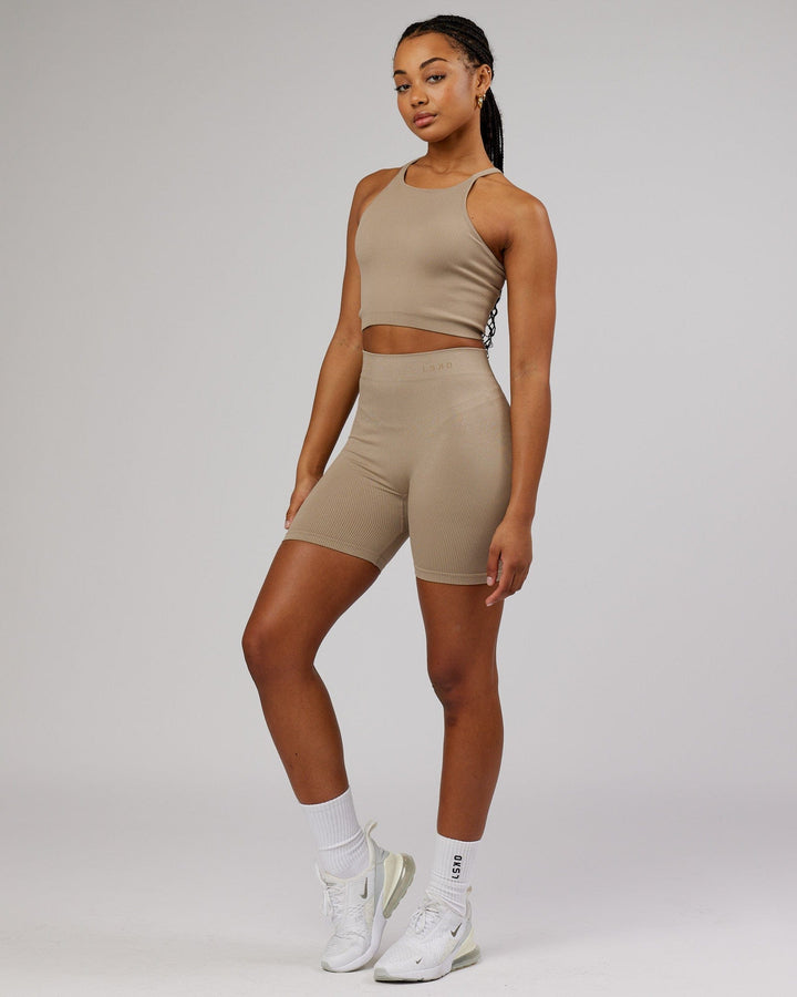 Woman wearing Minimal Seamless Crop Ribbed Tank - Taupe