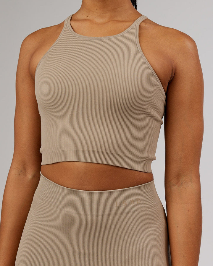 Woman wearing Minimal Seamless Crop Ribbed Tank - Taupe