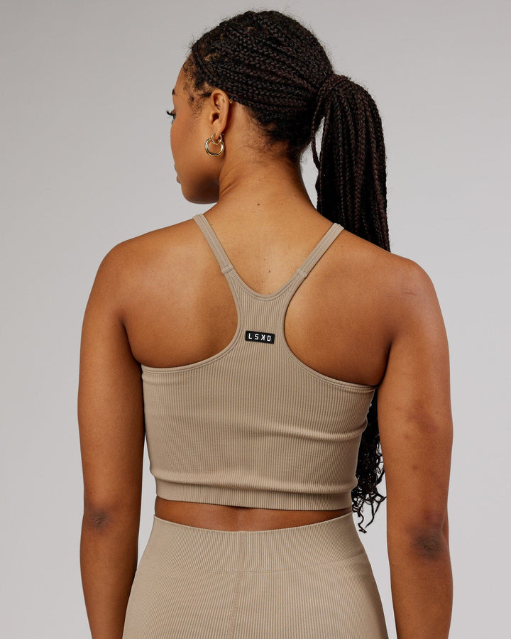 Woman wearing Minimal Seamless Crop Ribbed Tank - Taupe