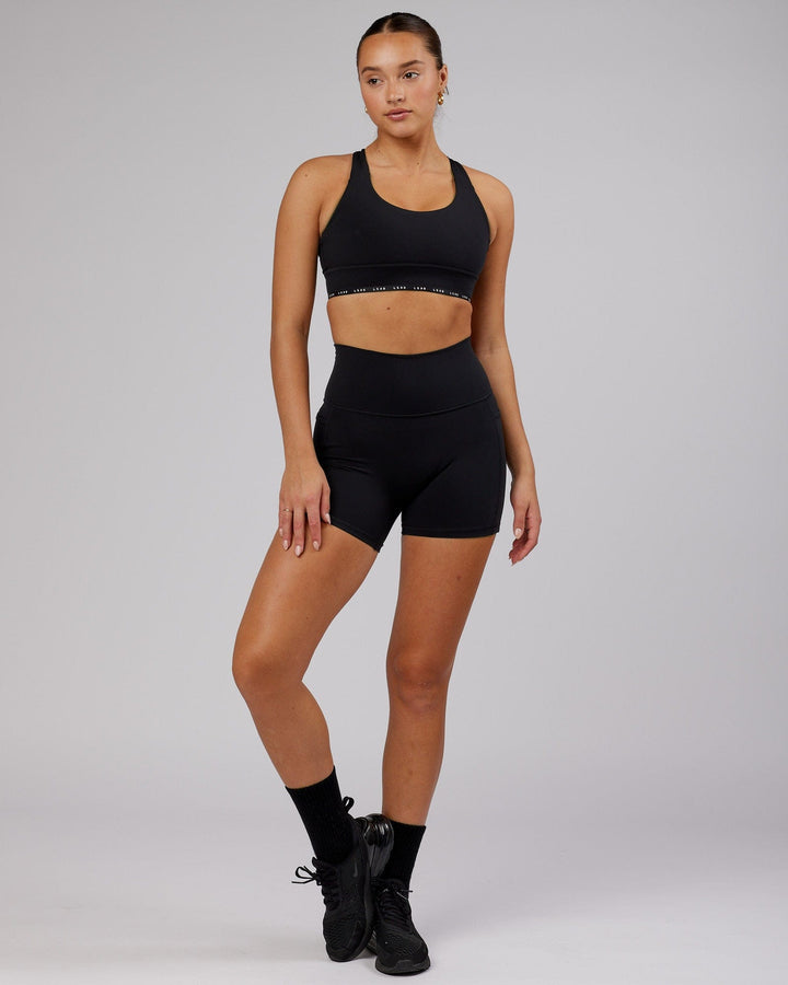 Woman wearing MVP Sports Bra - Black