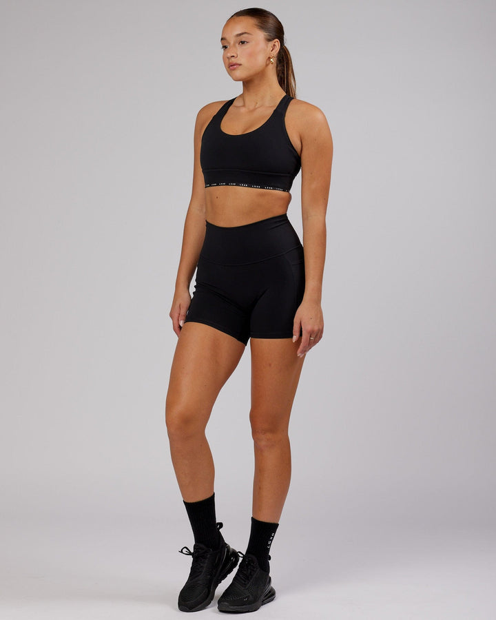 Woman wearing MVP Sports Bra - Black