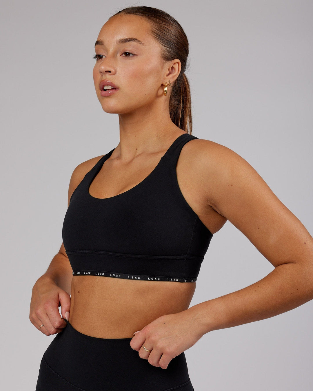Woman wearing MVP Sports Bra - Black