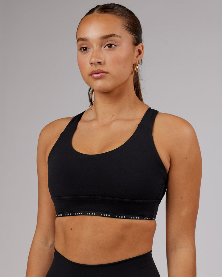 Woman wearing MVP Sports Bra - Black