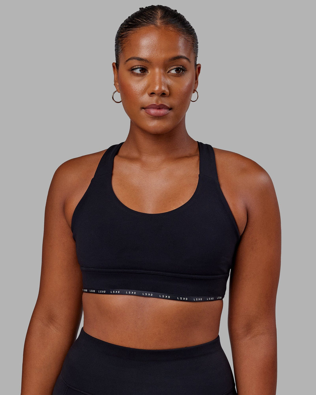 Woman wearing MVP Sports Bra - Black