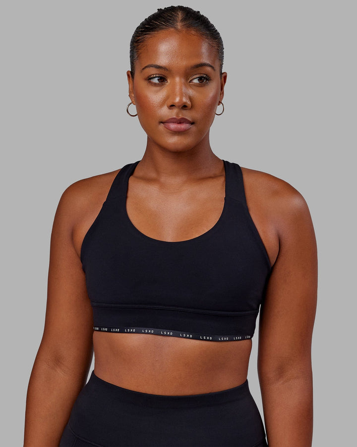 Woman wearing MVP Sports Bra - Black