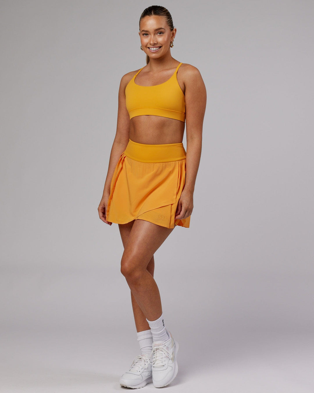 Woman wearing Rally Skirt - Butterscotch