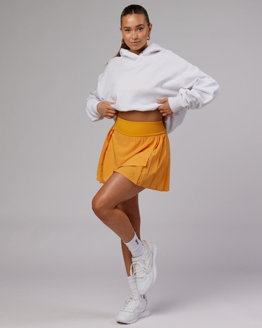 Woman wearing Rally Skirt - Butterscotch
