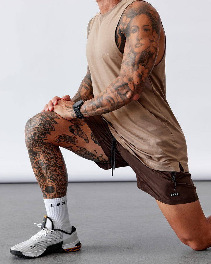 Man wearing Rep 5'' Performance Short - Dark Chocolate