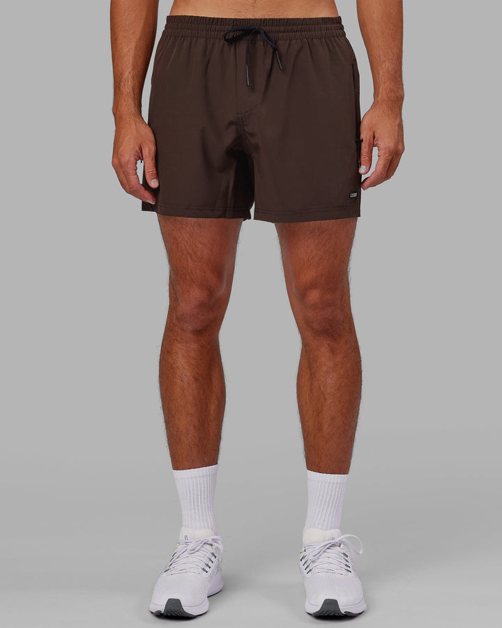 Man wearing Rep 5'' Performance Short - Dark Chocolate