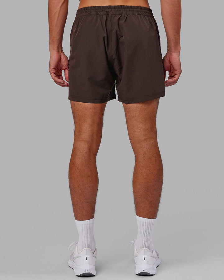 Man wearing Rep 5'' Performance Short - Dark Chocolate