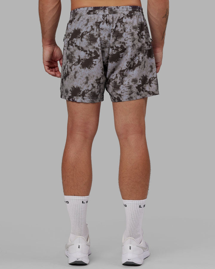 Man wearing Rep 5" Performance Short - Asphalt Tie Dye