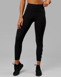 Woman wearing Rep Ultra High-Rise 7/8 Legging Pockets - Black-White | Model:Isabella | Size:S