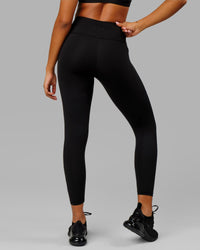 Woman wearing Rep Ultra High-Rise 7/8 Legging Pockets - Black-White | Model:Isabella | Size:S