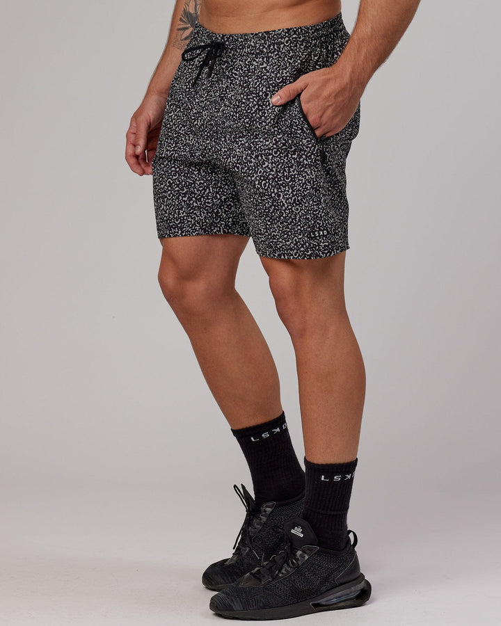 Man wearing Rep 7'' Performance Short - Black Spotty