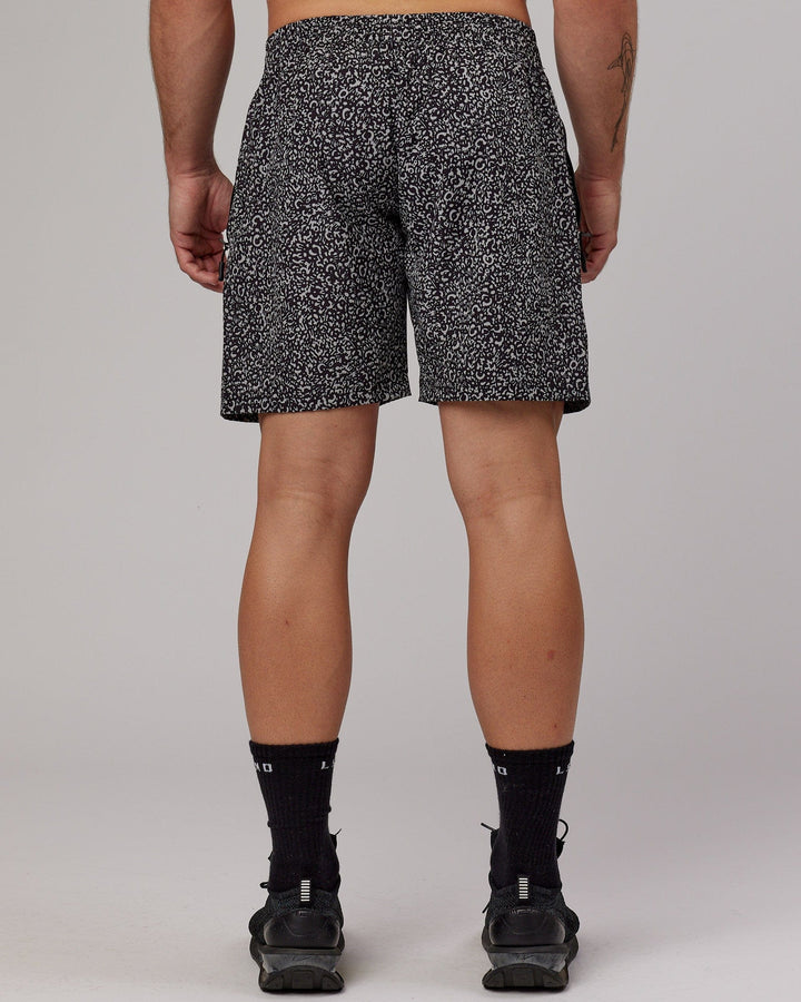 Man wearing Rep 7'' Performance Short - Black Spotty