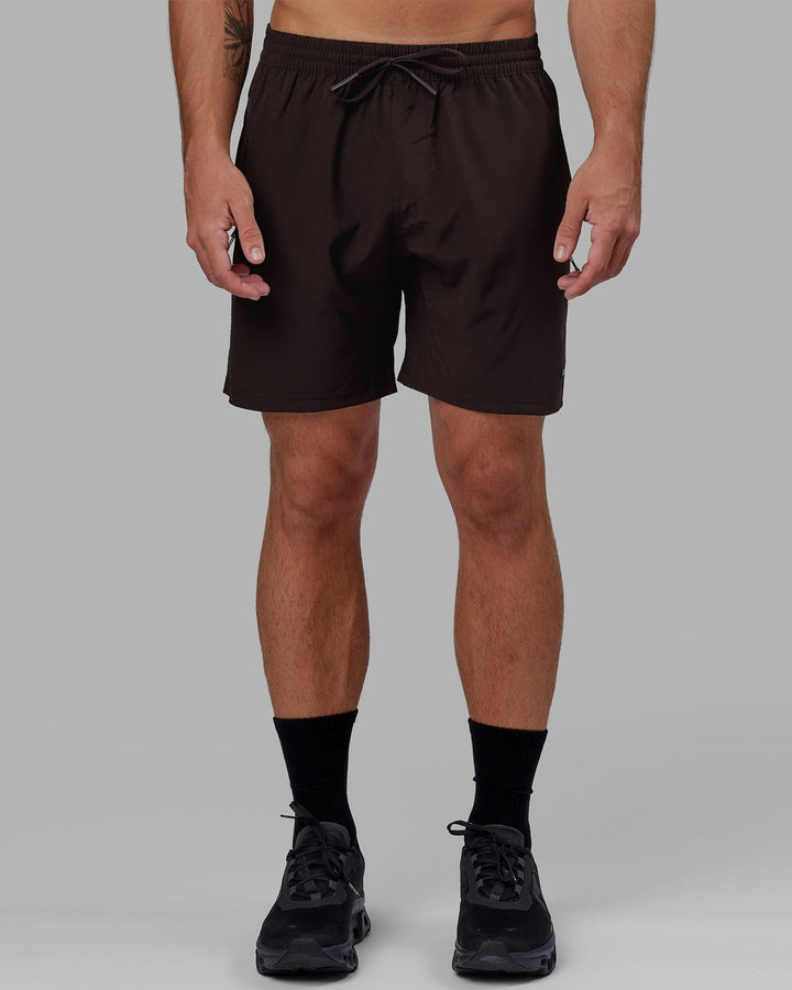 Man wearing Rep 7'' Performance Short - Dark Walnut