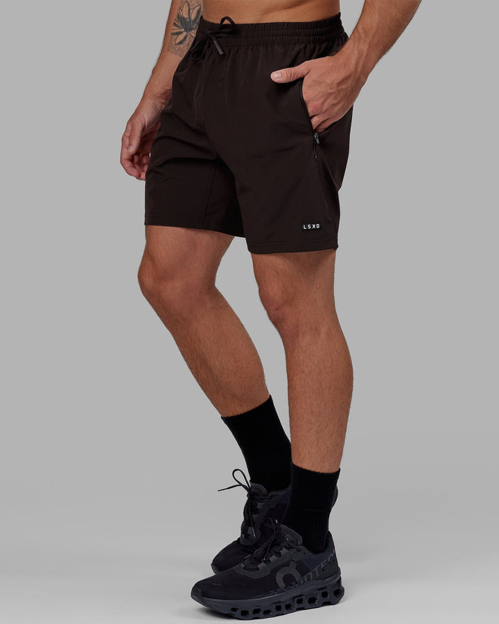 Man wearing Rep 7'' Performance Short - Dark Walnut