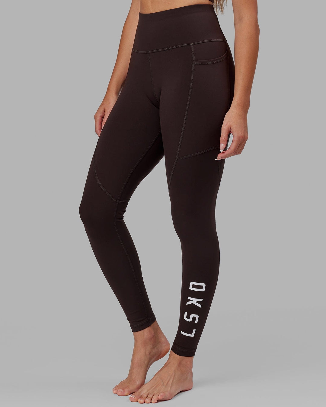 Woman wearing Rep Ultra High-Rise Full Length Legging Pockets - Dark Walnut | Model:Catalina | Size:S