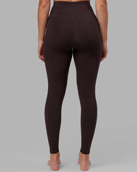 Woman wearing Rep Ultra High-Rise Full Length Legging Pockets - Dark Walnut | Model:Catalina | Size:S