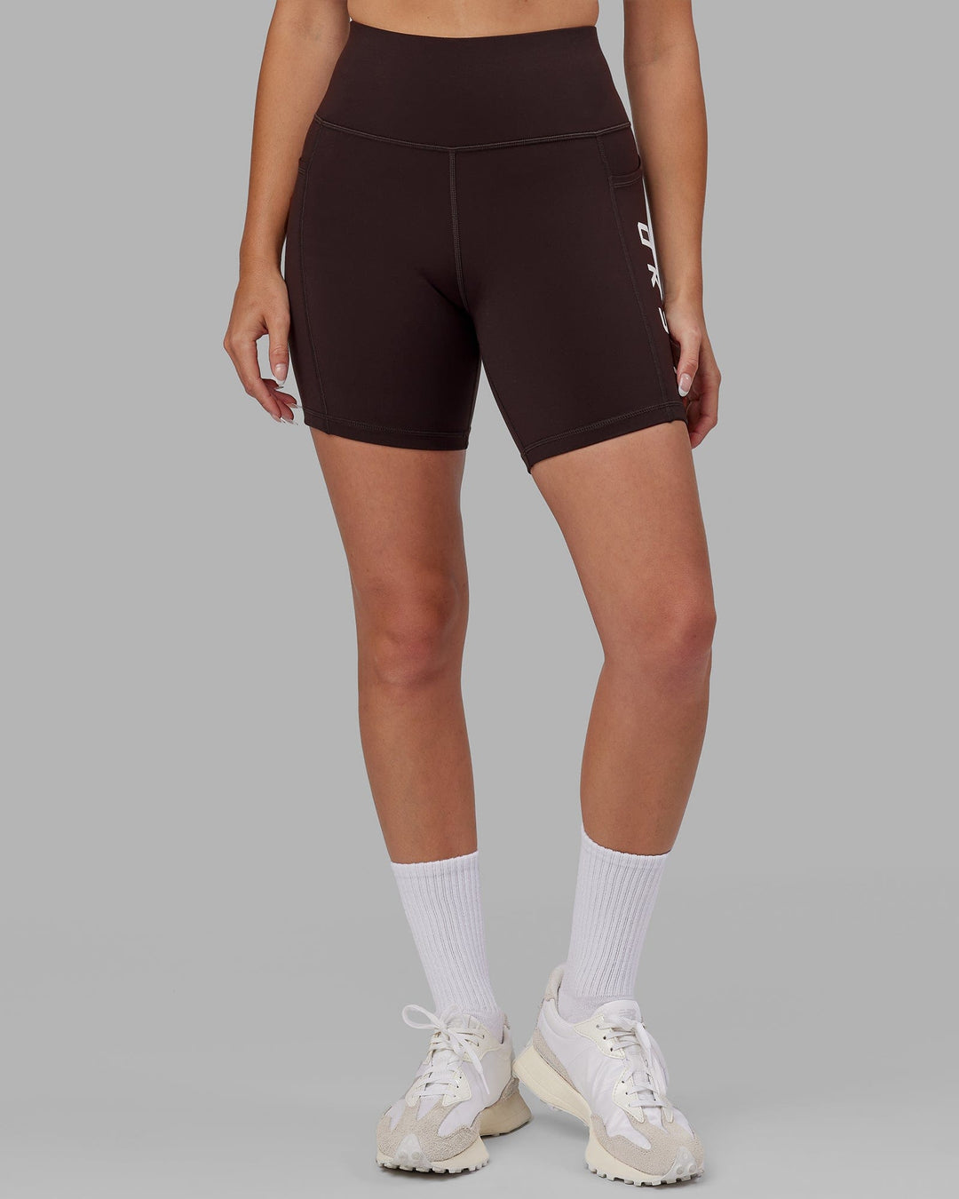 Woman wearing Rep Mid Short Tight - Dark Walnut