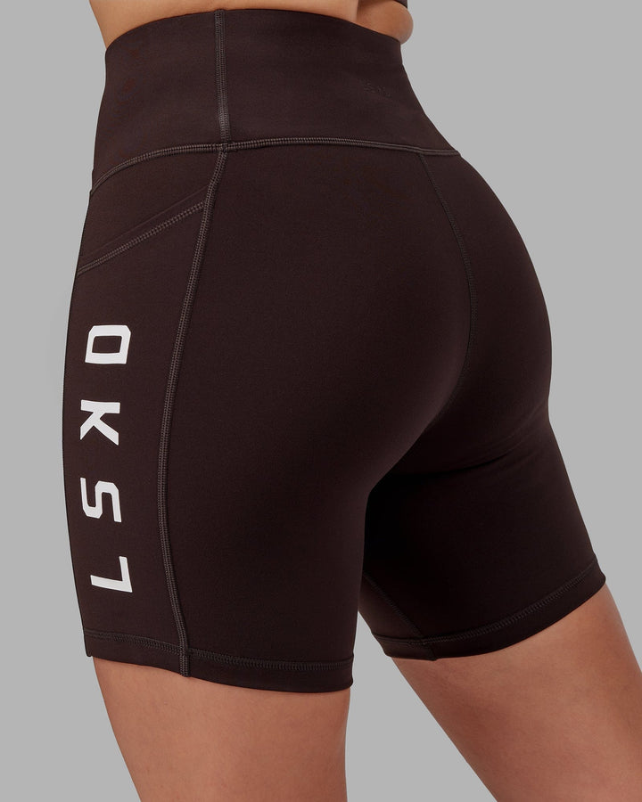 Woman wearing Rep Mid Short Tight - Dark Walnut