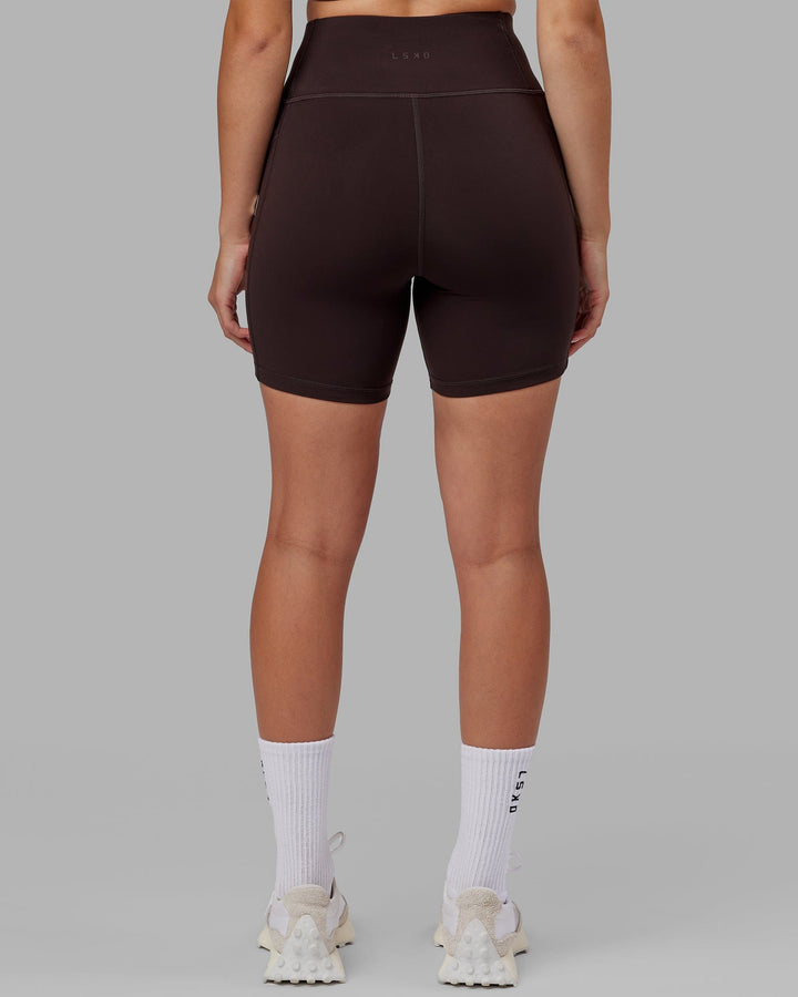 Woman wearing Rep Mid Short Tight - Dark Walnut