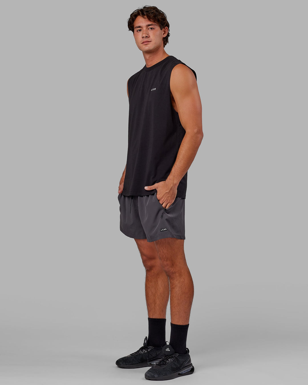 Man wearing Rep 5'' Performance Short - Asphalt