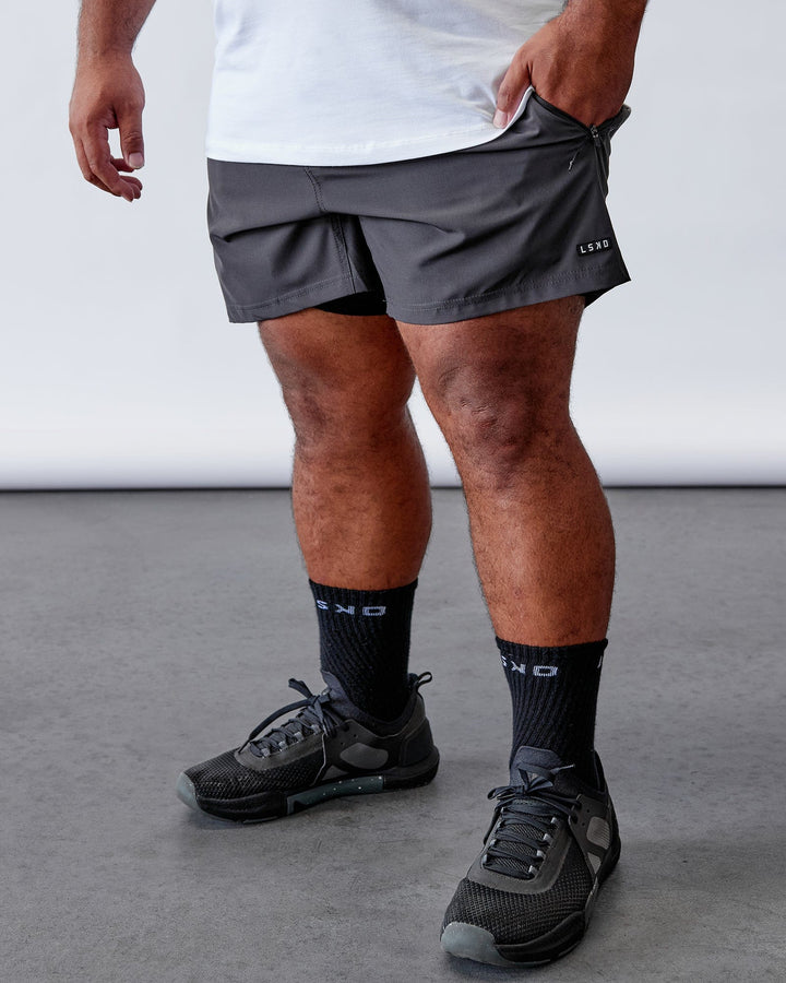 Man wearing Rep 5'' Performance Short - Asphalt