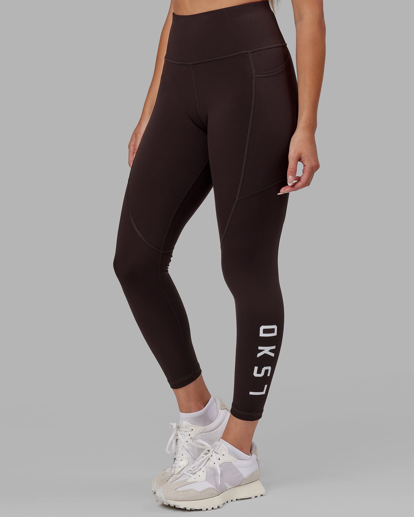 Woman wearing Rep Ultra High-Rise 7/8 Legging Pockets - Dark Walnut | Model:Catalina | Size:S