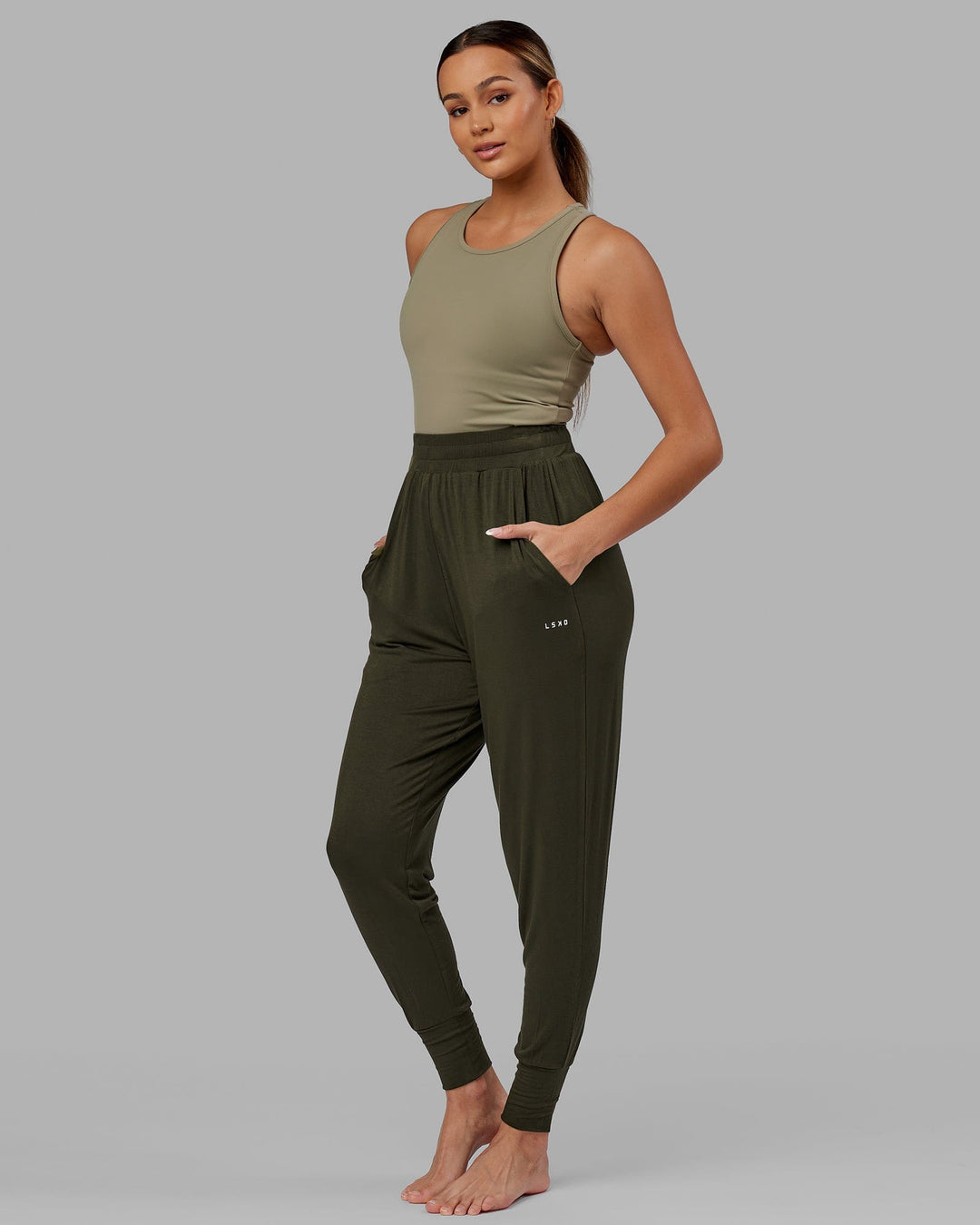Woman wearing Rest and Recover Pant - Forest Night