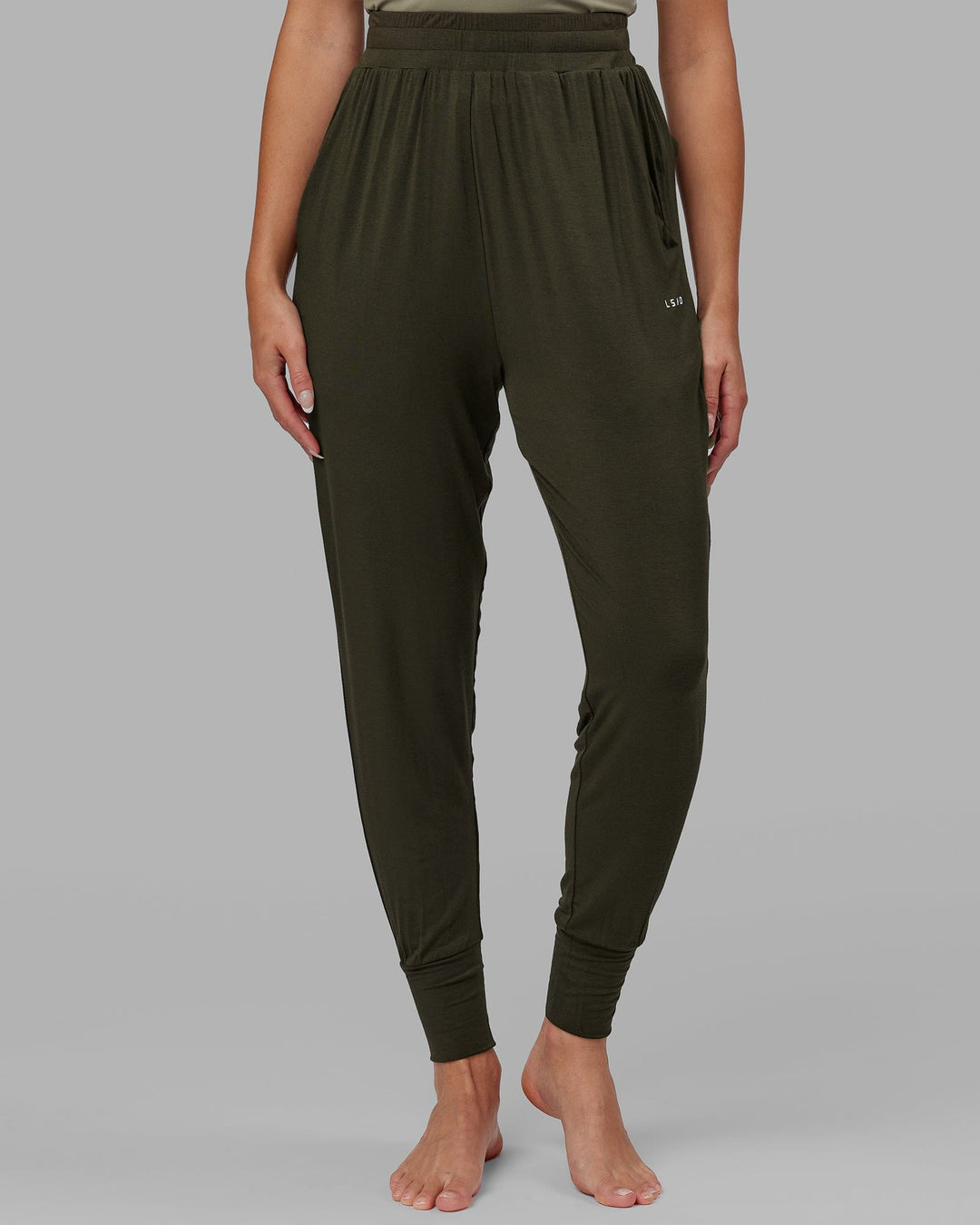 Woman wearing Rest and Recover Pant - Forest Night