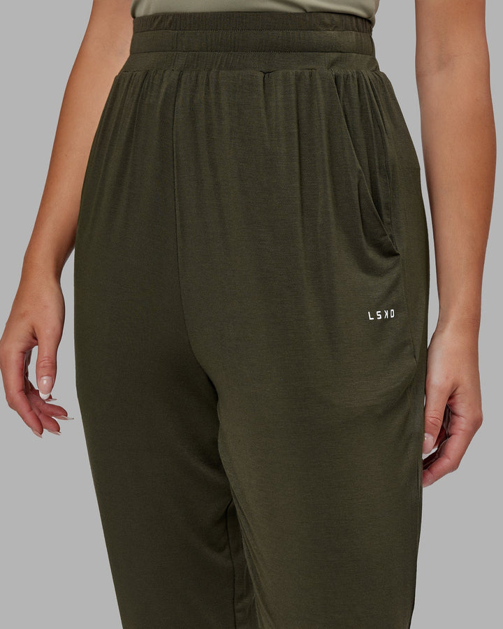 Woman wearing Rest and Recover Pant - Forest Night