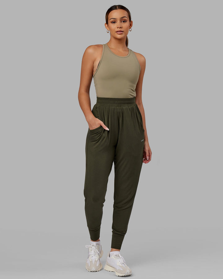 Woman wearing Rest and Recover Pant - Forest Night