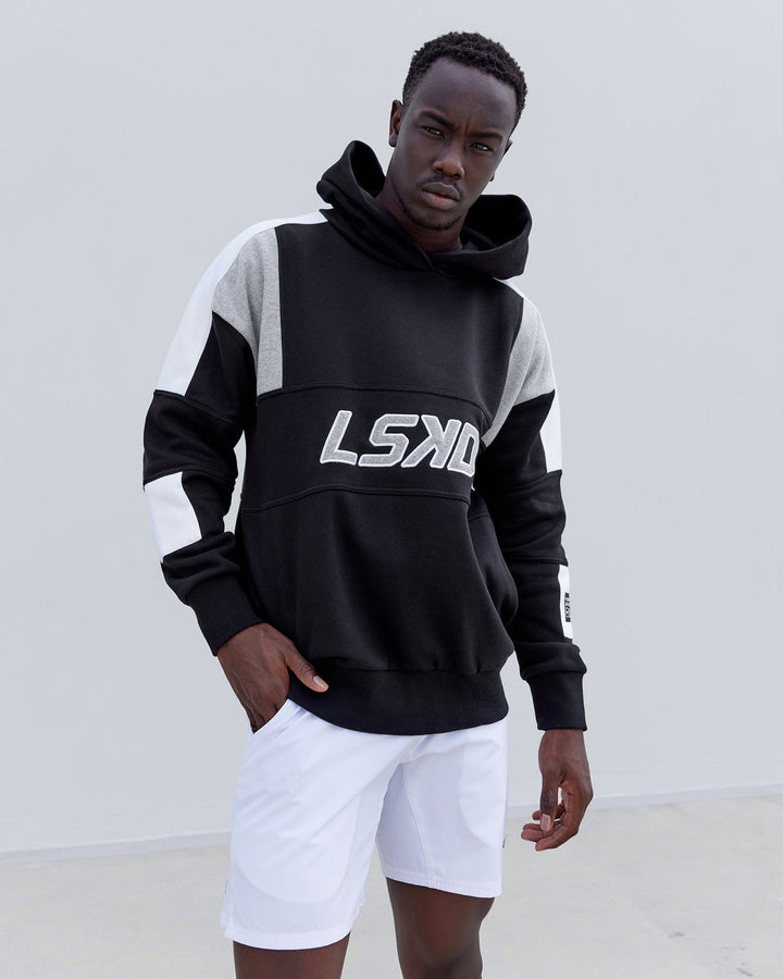 Man wearing Unisex Slam Hoodie Oversize - Black-Lt Grey Marl