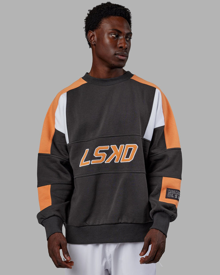 Man wearing Unisex Slam Sweater Oversize - Asphalt-Tangerine