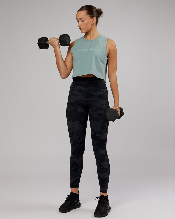 Woman wearing Speedway FLXCOTTON Cropped Tank - Frost