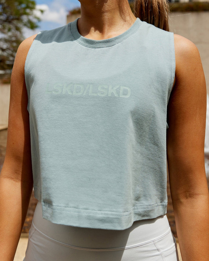 Woman wearing Speedway FLXCOTTON Cropped Tank - Frost