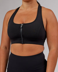 Woman wearing Sprint Sports Bra - Black