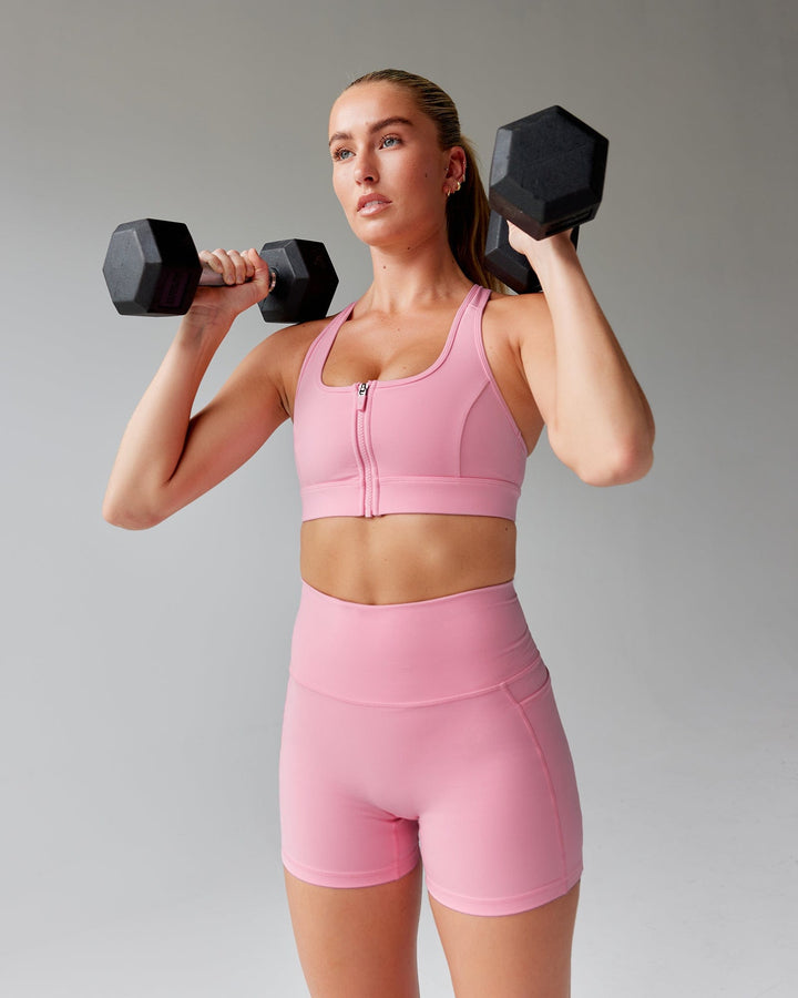 Woman wearing Sprint Sports Bra - Pink Frosting