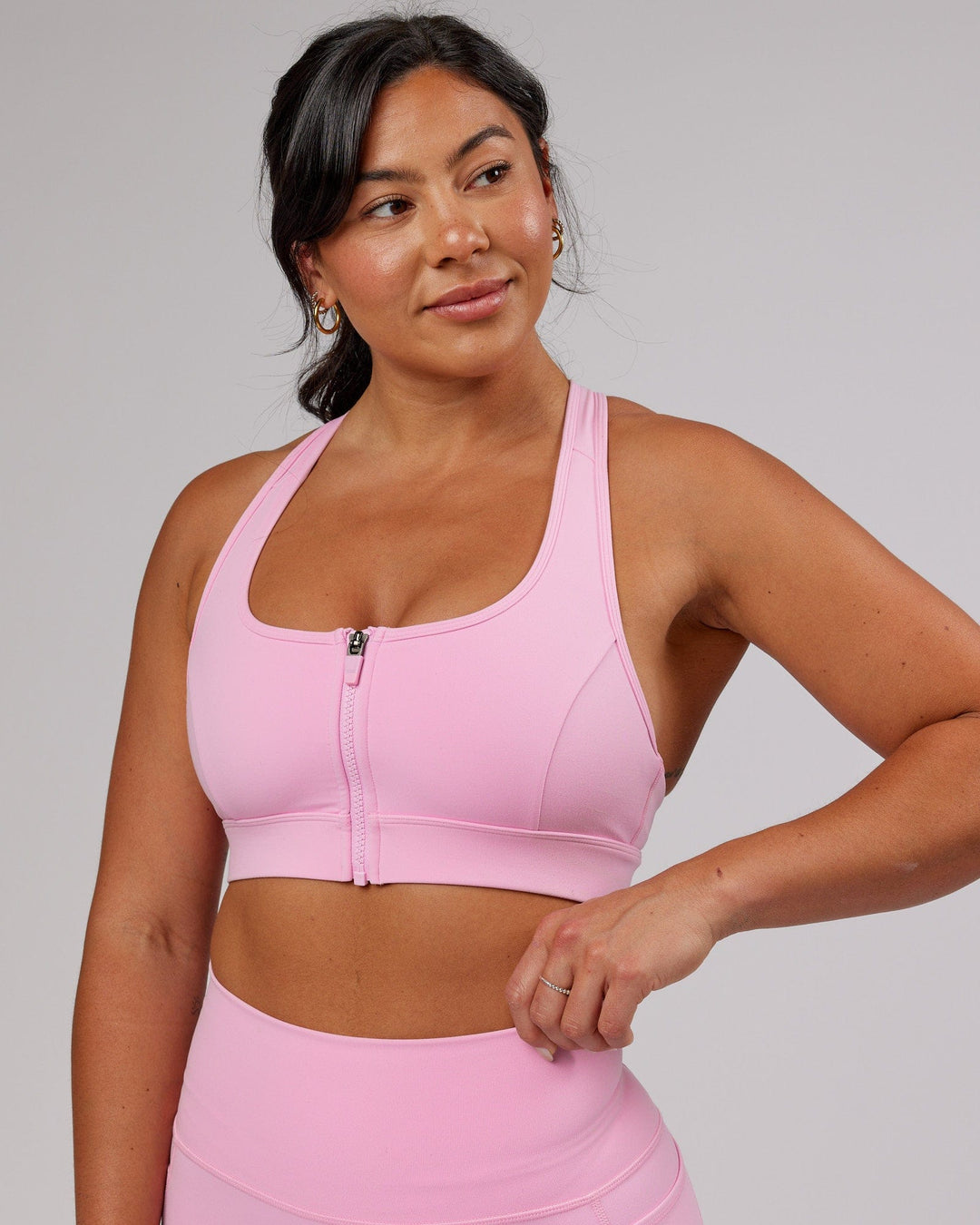 Woman wearing Sprint Sports Bra - Pink Frosting