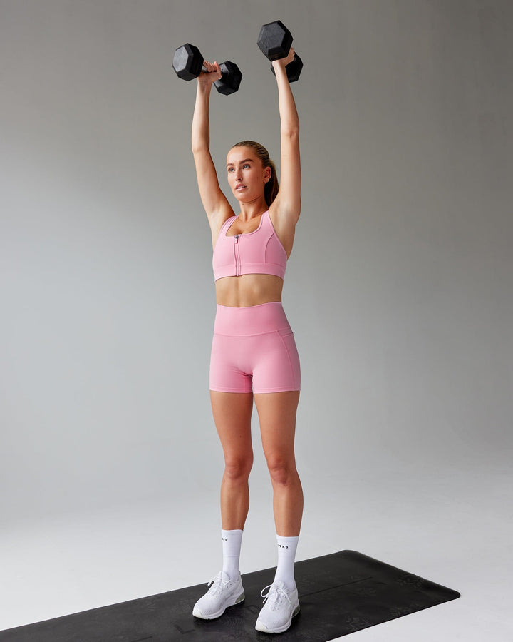 Woman wearing Sprint Sports Bra - Pink Frosting