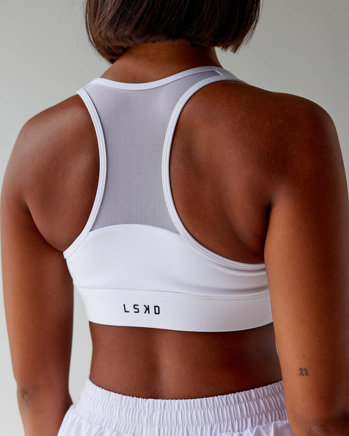 Woman wearing Sprint Sports Bra - White