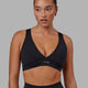 Woman wearing Stamina Sports Bra - Black