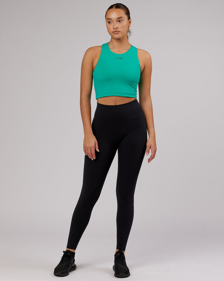 Woman wearing Status Shelf Bra Active Tank - Hyper Teal
