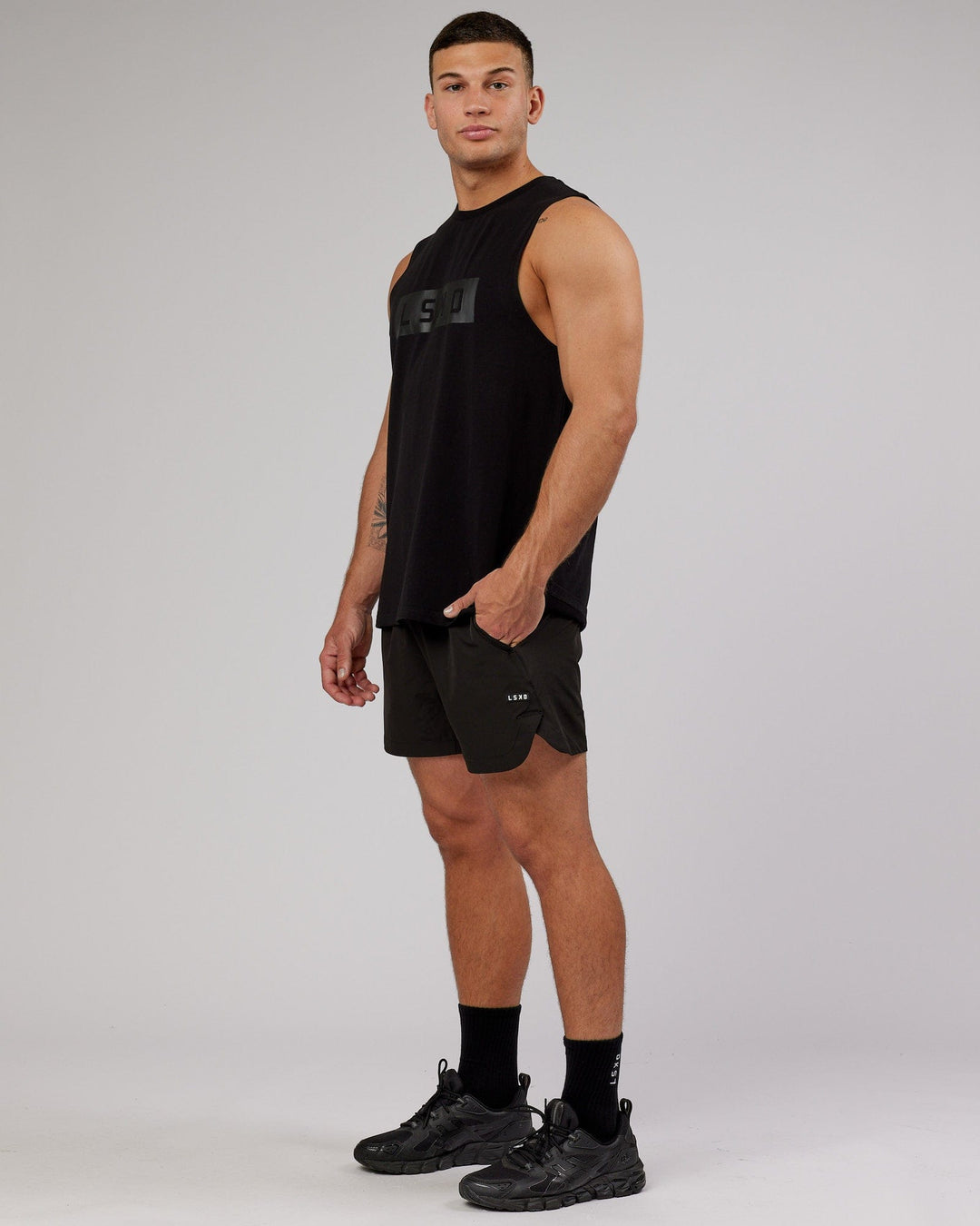 Man wearing Strength FLXCotton Training Fit Tank - Black-Black